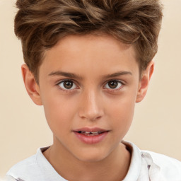 Joyful white child male with short  brown hair and brown eyes