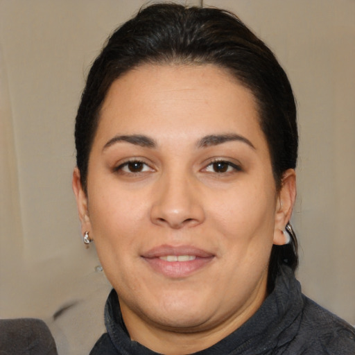 Joyful white adult female with medium  brown hair and brown eyes