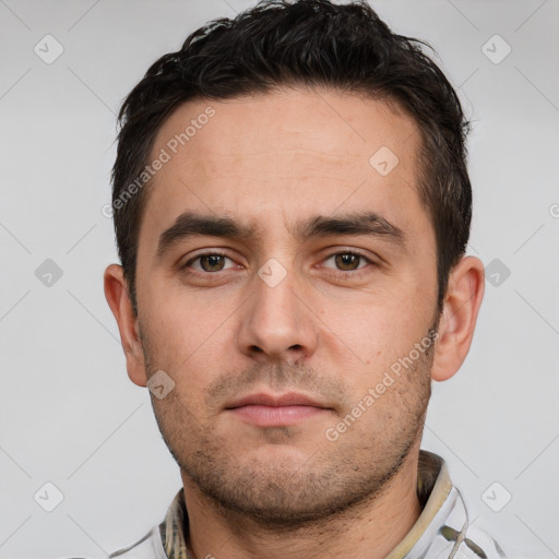 Neutral white young-adult male with short  brown hair and brown eyes