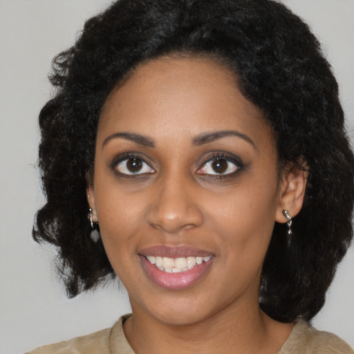 Joyful latino young-adult female with medium  black hair and brown eyes