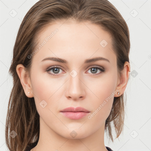 Neutral white young-adult female with long  brown hair and brown eyes