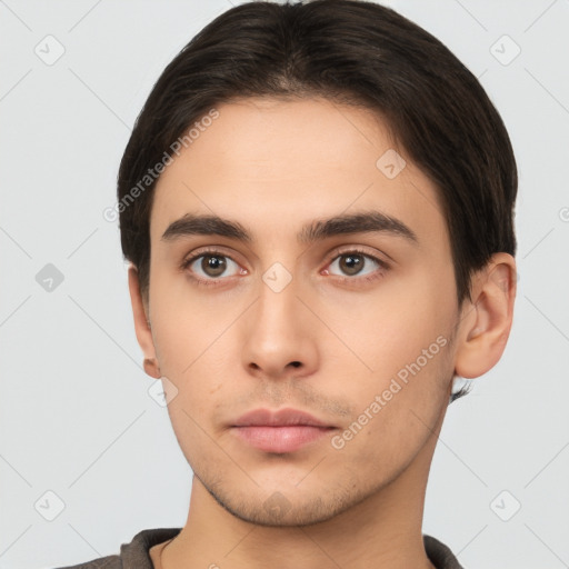 Neutral white young-adult male with short  brown hair and brown eyes