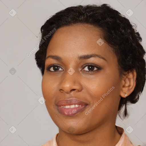 Joyful black young-adult female with medium  brown hair and brown eyes