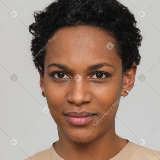 Joyful black young-adult female with short  black hair and brown eyes