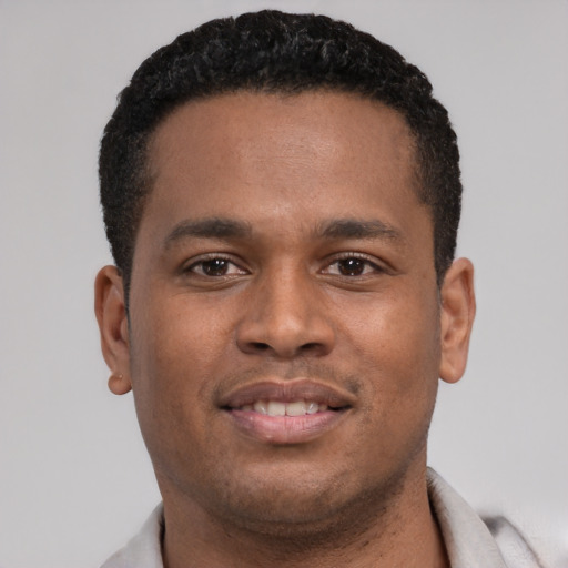 Neutral latino young-adult male with short  brown hair and brown eyes