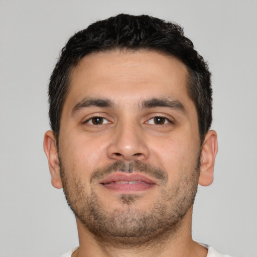 Neutral latino young-adult male with short  brown hair and brown eyes