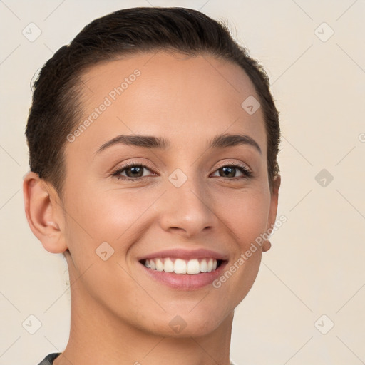 Joyful white young-adult female with short  brown hair and brown eyes