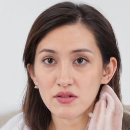 Joyful white young-adult female with medium  brown hair and brown eyes