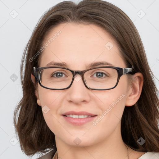 Joyful white young-adult female with medium  brown hair and blue eyes