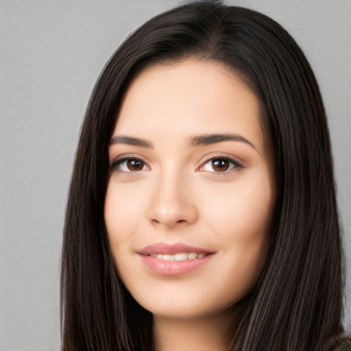 Joyful white young-adult female with long  black hair and brown eyes