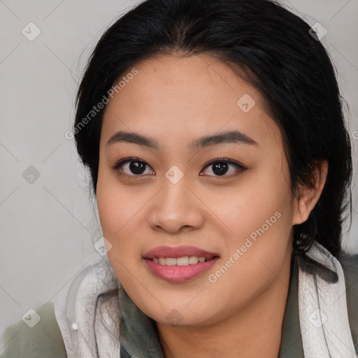 Joyful asian young-adult female with long  brown hair and brown eyes