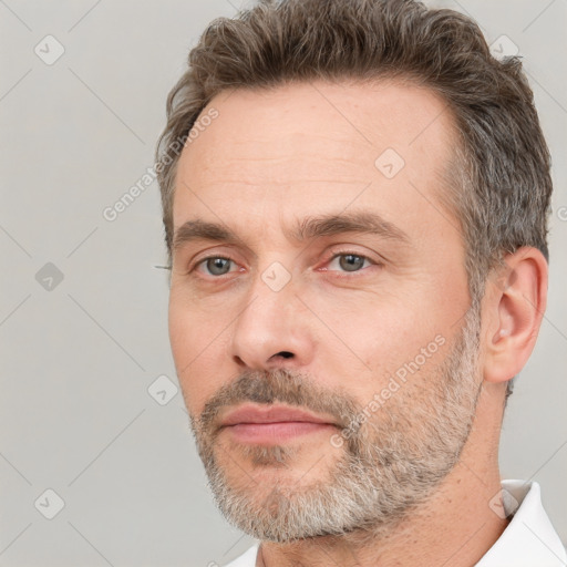 Neutral white adult male with short  brown hair and brown eyes