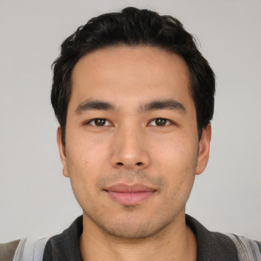 Neutral asian young-adult male with short  black hair and brown eyes