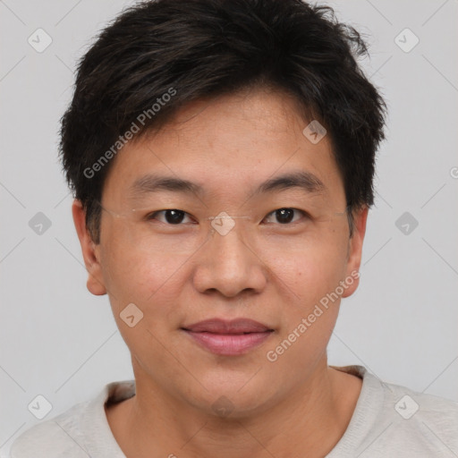 Joyful asian young-adult male with short  brown hair and brown eyes