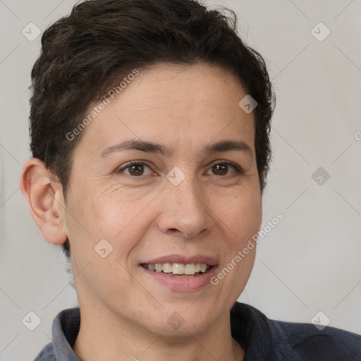 Joyful white adult female with short  brown hair and brown eyes