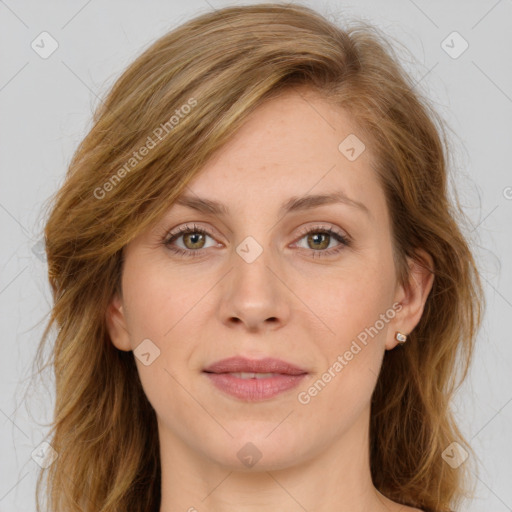 Joyful white adult female with long  brown hair and brown eyes