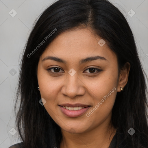 Joyful latino young-adult female with long  brown hair and brown eyes