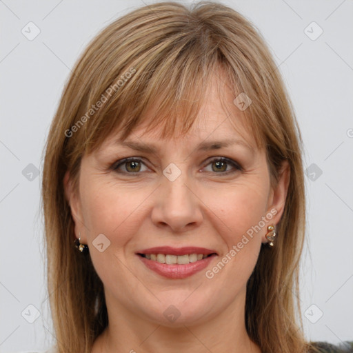 Joyful white adult female with medium  brown hair and grey eyes