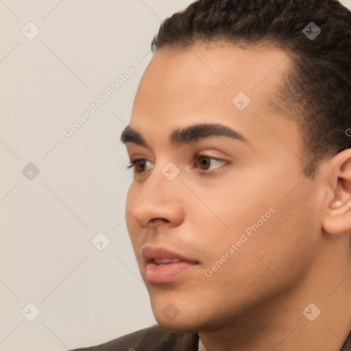 Neutral white young-adult male with short  black hair and brown eyes