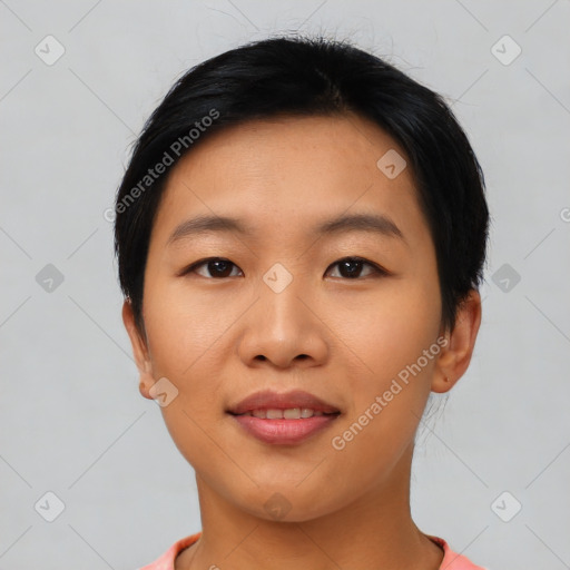 Joyful asian young-adult female with short  black hair and brown eyes