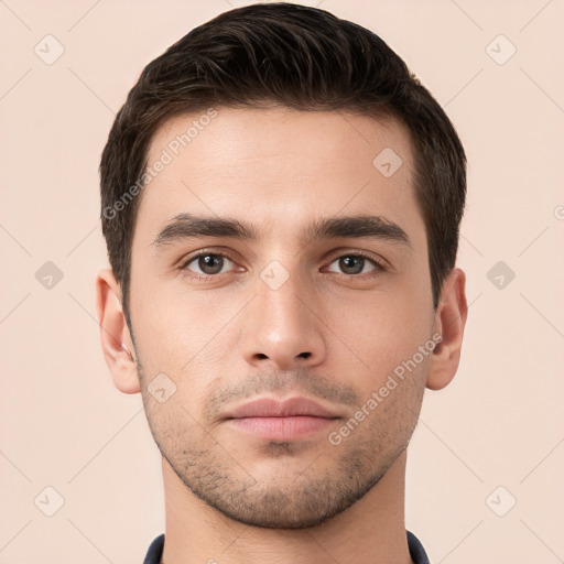 Neutral white young-adult male with short  brown hair and brown eyes