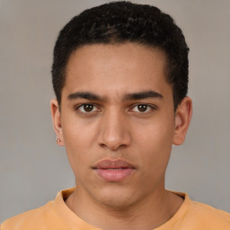 Neutral latino young-adult male with short  brown hair and brown eyes