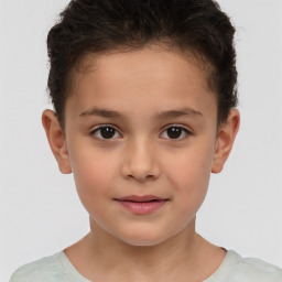 Joyful white child female with short  brown hair and brown eyes