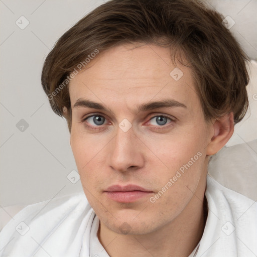 Neutral white young-adult male with short  brown hair and grey eyes