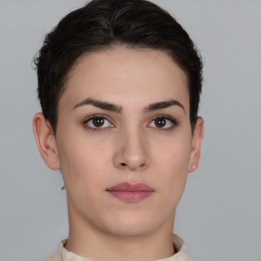 Neutral white young-adult female with short  brown hair and brown eyes