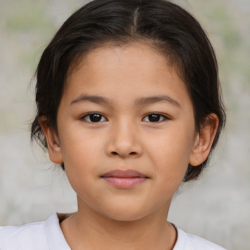Joyful white child female with medium  brown hair and brown eyes