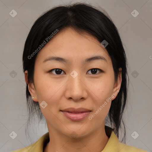 Joyful asian young-adult female with medium  brown hair and brown eyes