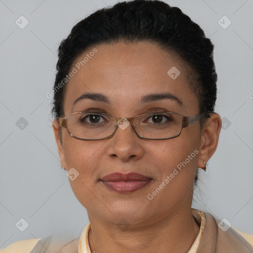 Joyful latino adult female with short  brown hair and brown eyes