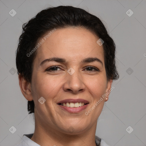 Joyful white adult female with short  brown hair and brown eyes