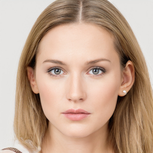 Neutral white young-adult female with long  brown hair and grey eyes