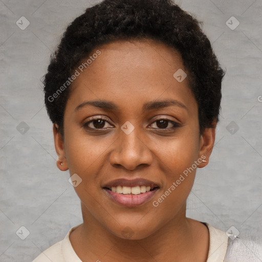 Joyful black young-adult female with short  brown hair and brown eyes