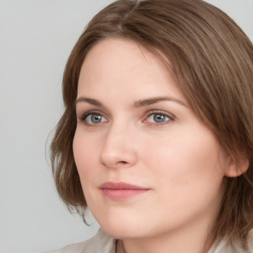 Neutral white young-adult female with medium  brown hair and grey eyes