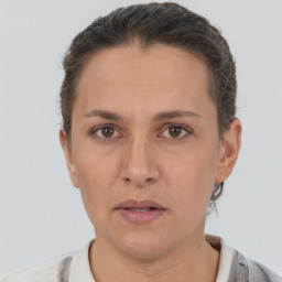 Neutral white adult female with short  brown hair and brown eyes