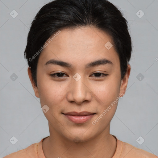 Joyful asian young-adult female with short  brown hair and brown eyes