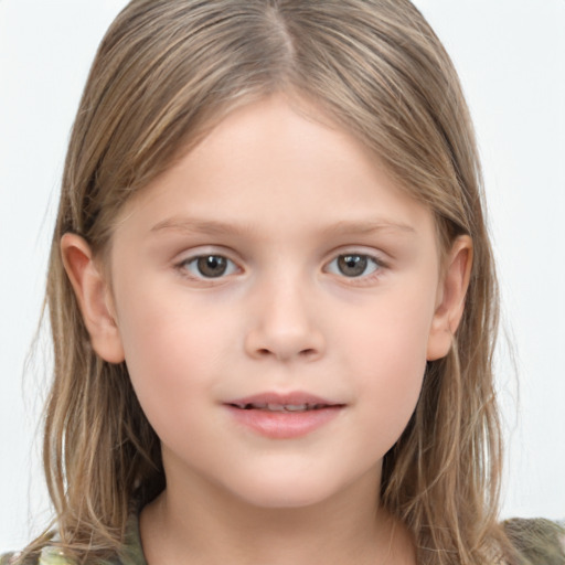 Joyful white child female with medium  brown hair and grey eyes