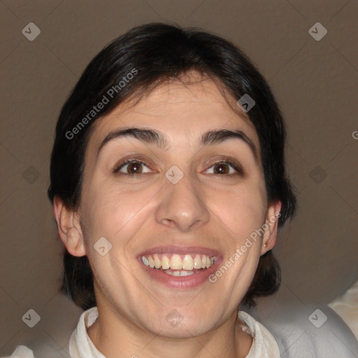 Joyful white adult female with medium  brown hair and brown eyes