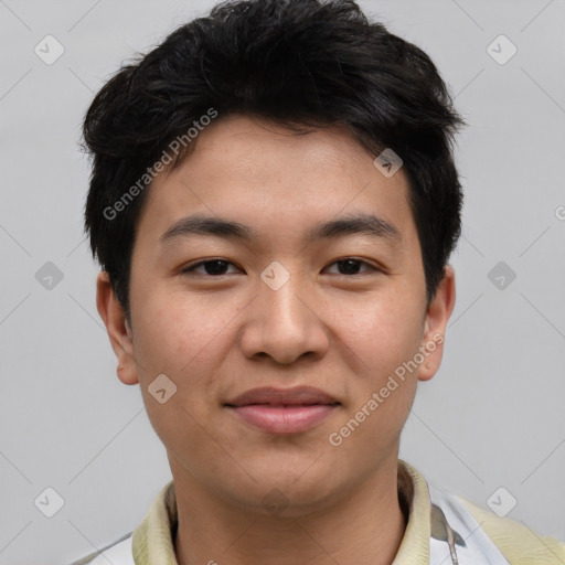 Joyful asian young-adult male with short  black hair and brown eyes