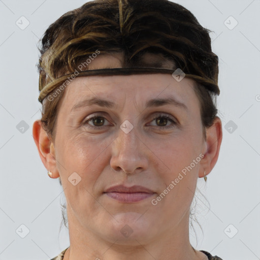 Joyful white adult female with short  brown hair and brown eyes