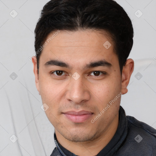 Joyful white young-adult male with short  black hair and brown eyes