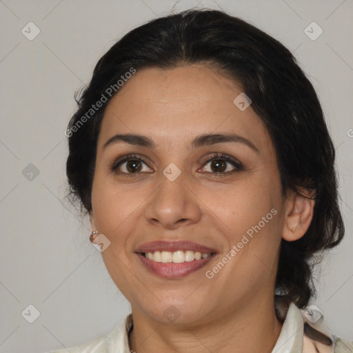 Joyful latino young-adult female with medium  brown hair and brown eyes