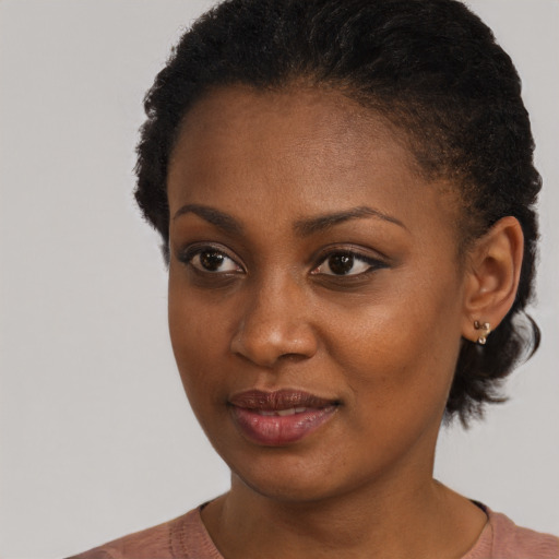 Neutral black young-adult female with short  black hair and brown eyes