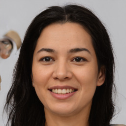 Joyful asian young-adult female with long  brown hair and brown eyes