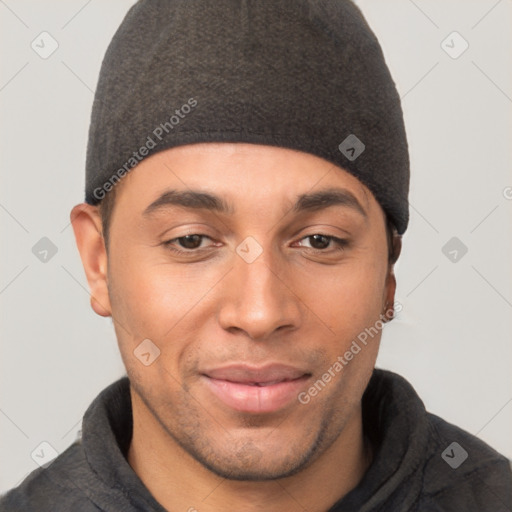 Joyful white young-adult male with short  black hair and brown eyes