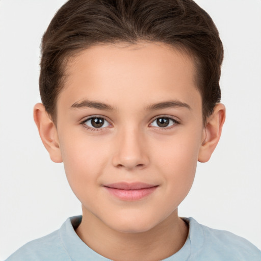 Joyful white child female with short  brown hair and brown eyes