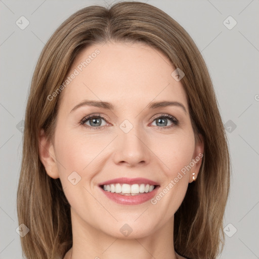 Joyful white young-adult female with medium  brown hair and green eyes