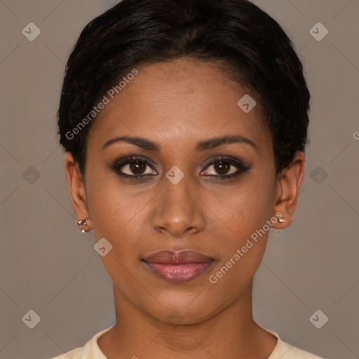 Joyful black young-adult female with short  brown hair and brown eyes